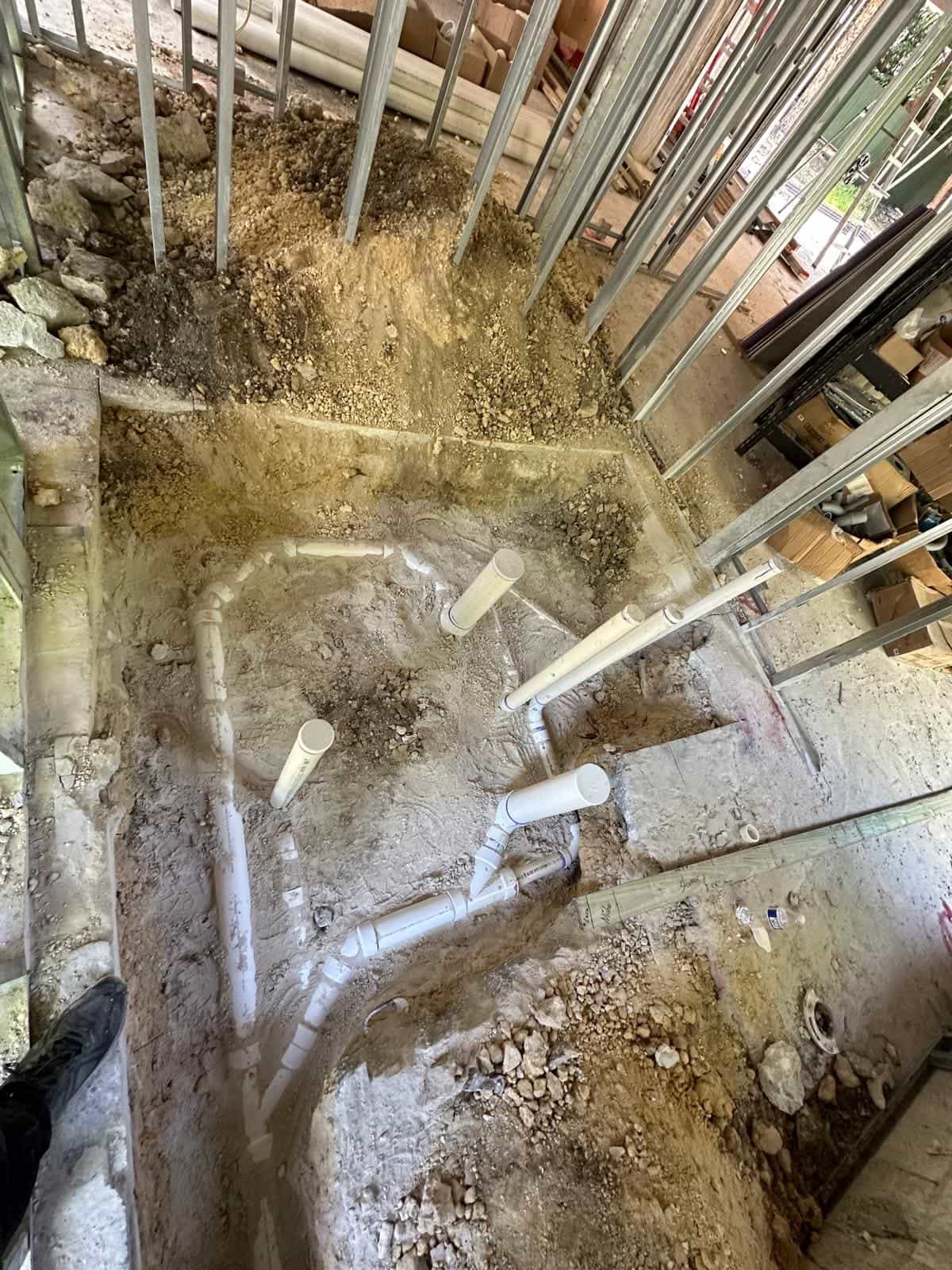 Before and after of a Underground pipe assemply by a plumber in South Miami